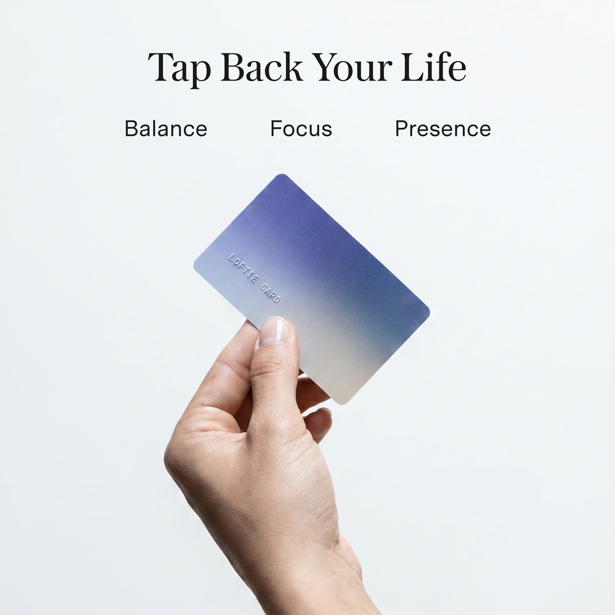 Hand holding the Loftie Card with the words Balance, Focus and Presence
